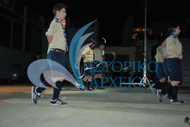 Κοινότητες παρουσιάζουν τα χορευτικά τους στην έναρξη της 27ης Πανελλήνιας Ανιχνευτικής Πολιτιστικής Ενημέρωσης στο Πειραιά το 2011.