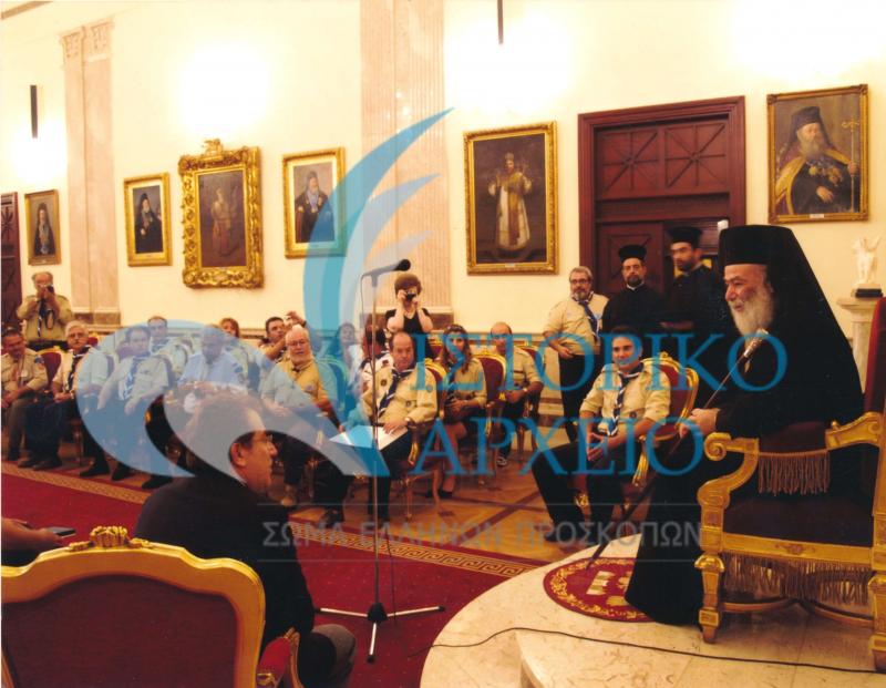 Από την απονομή του μεταλλείου Αργυρού Φοίνικα στον Πατριάρχη Αλεξανδρείας & Πάσης Αφρικής Θεόδωρο Β' το 2006. Διακρίνονται: Χρ. Σταθόπουλος - Πρόεδρος ΔΣ ΣΕΠ, Ε. Μπακογιάννης - Γενικός Γραμματέας ΣΕΠ, Ν. Χαραλαμπόπουλος - Οικονομικός Σύμβουλος.